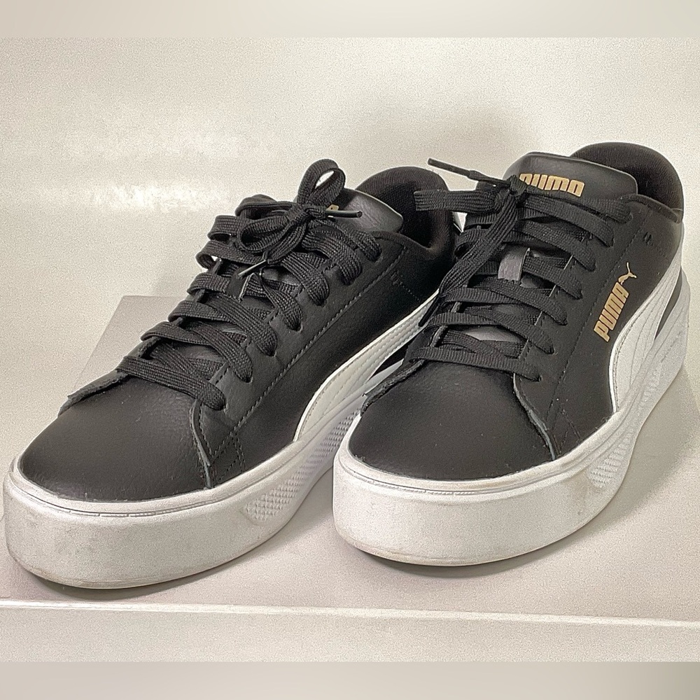 Puma Black Sneakers with Gold Logo
